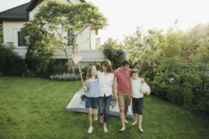 Happy family playing outside