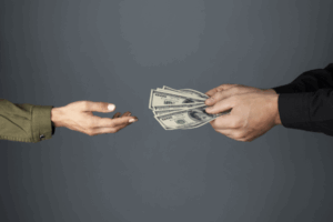 Professional Vs. Diy Pest Control 1 Hand giving money