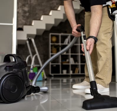 Box Elder Bug Infestation Control 3 Man doing a vacuum cleaning