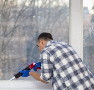 Man sealing edges
